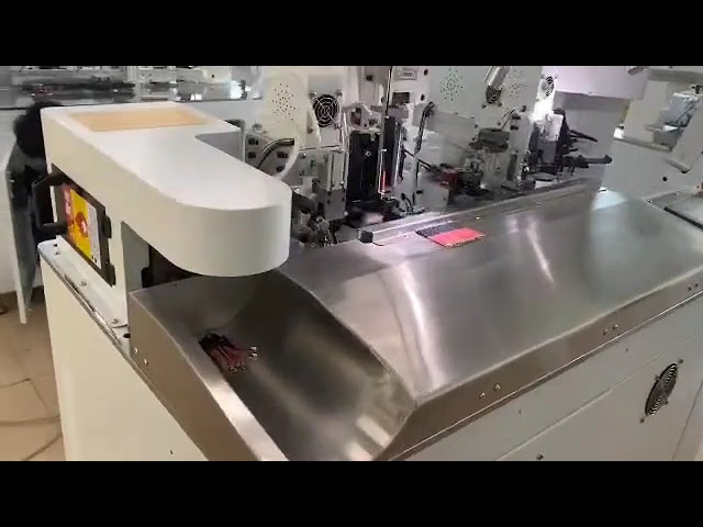 Täysautomaattinen kone liittimen puristukseen ja kutistesuojan asetukseen