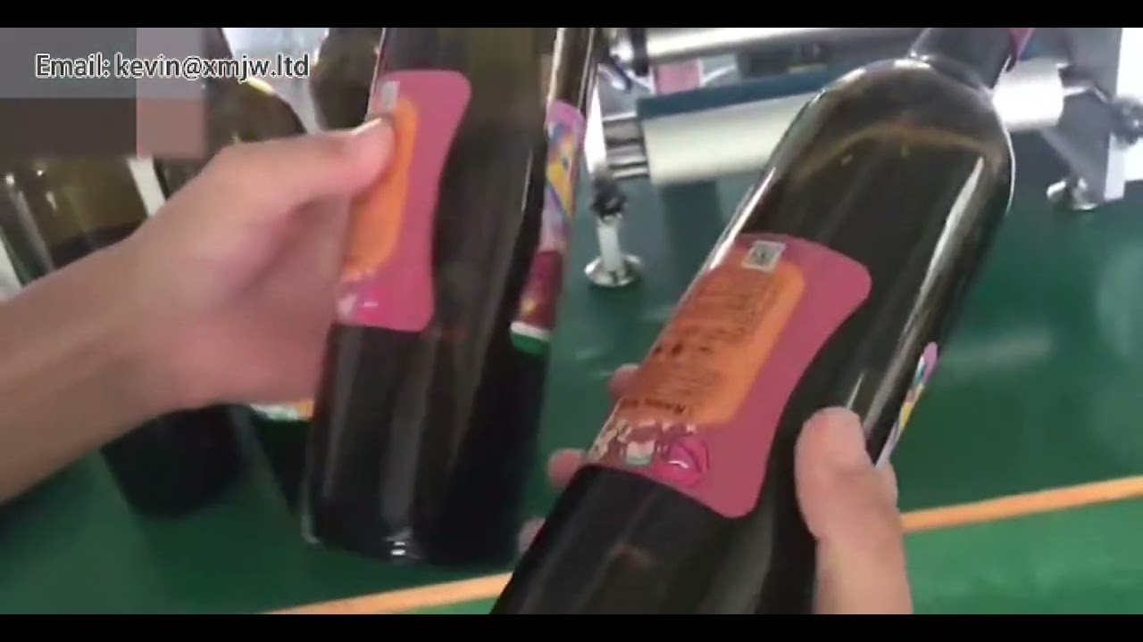 Wine bottle Cosmetic bottle taper round sticker taping equipment Semi automatic round bottle labelin